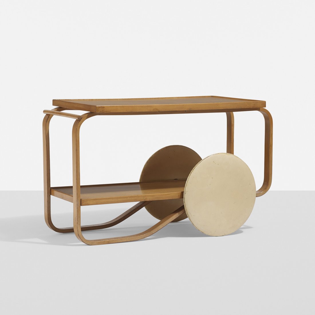 Alvar Aalto tea trolley: Alvar Aalto tea trolley O.y. Huonekalu Finland, 1936 birch, laminated birch, lacquered wood, vinyl 35.5 w x 17.75 d x 22 h inches Literature: Alvar Aalto Designer, Lahti, pg. 174 Alvar & Aino Aalto De