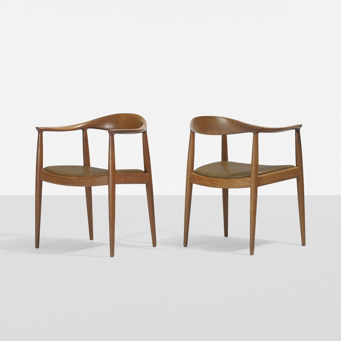 Hans Wegner The Chairs, pair: Hans Wegner The Chairs, pair Johannes Hansen for Knoll International Denmark, 1949/c. 1969 teak, leather 24.5 w x 20 d x 30 h inches Decal studio label to underside of chair: [Made for Knoll Internati