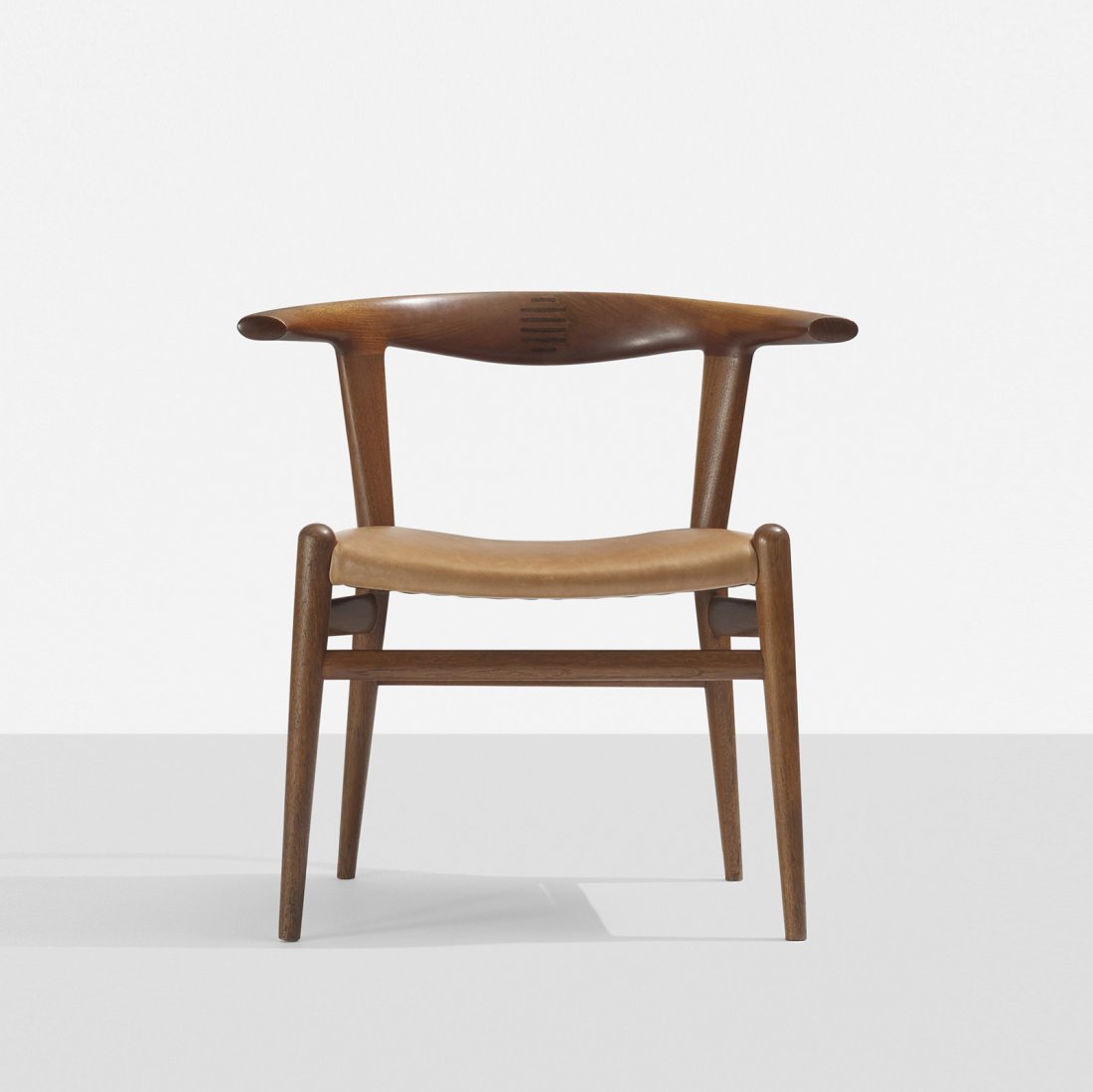 Hans Wegner Bull Horn chair: Hans Wegner Bull Horn chair Johannes Hansen Denmark, 1960 teak, leather, rosewood 28.5 w x 20.25 d x 28 h inches Literature: Hans J. Wegner's 100 Chairs, Oda, ppg. 90-91