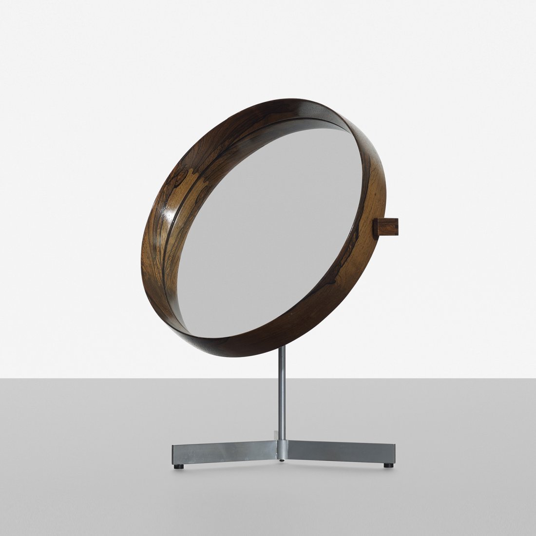 Uno and Osten Kristiansson mirror: Uno and Osten Kristiansson mirror Luxus Vittsjo Sweden, c. 1960 rosewood, mirrored glass, aluminum, chrome-plated steel, leather 11.5 w x 9.5 d x 15 h inches