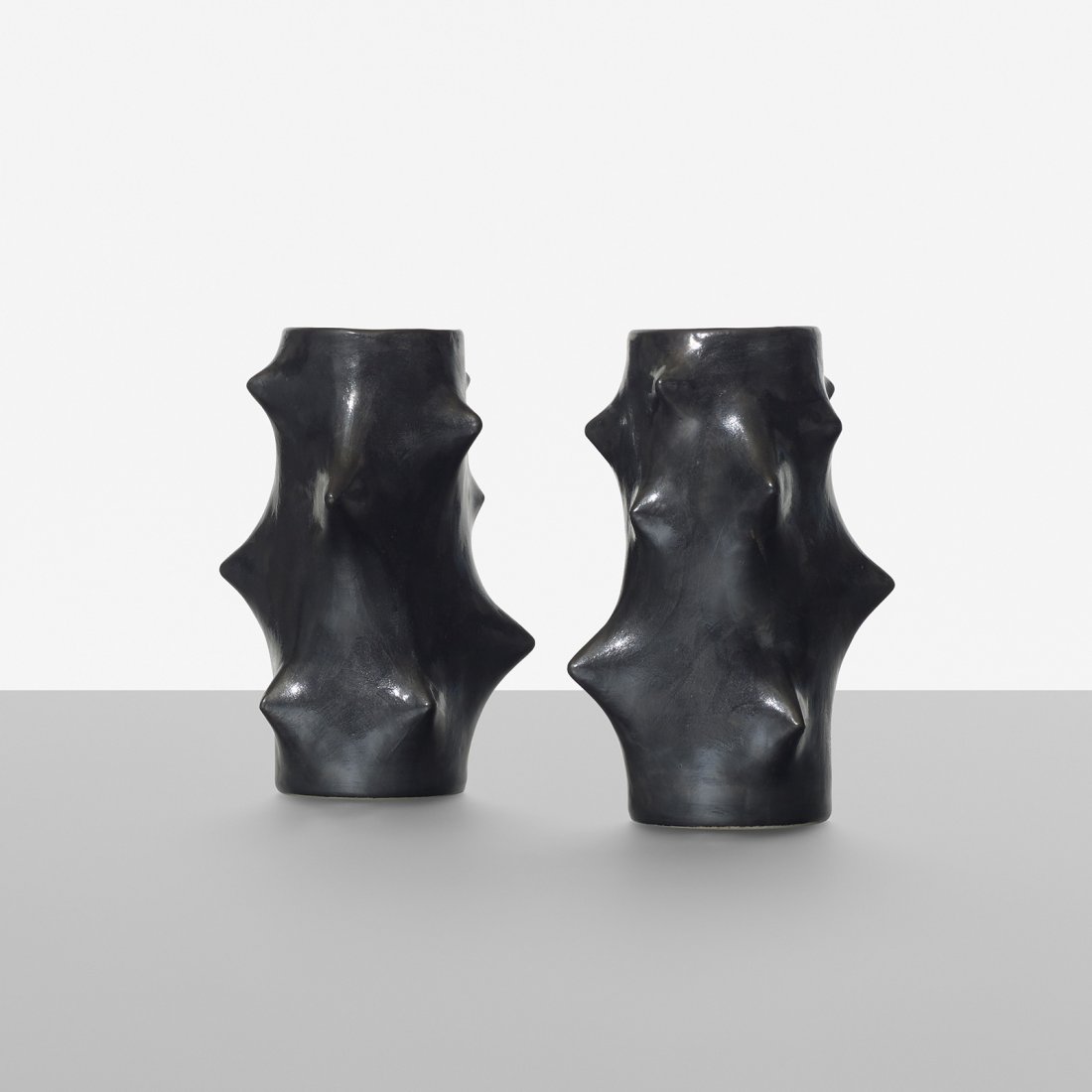 Knud Basse vases, pair: Knud Basse vases, pair Michael Andersen & Son Denmark, c. 1955 glazed stoneware 4.5 dia x 7 h inches Signed with studio cipher and manufacturer's mark to underside of each example: [5974-2].