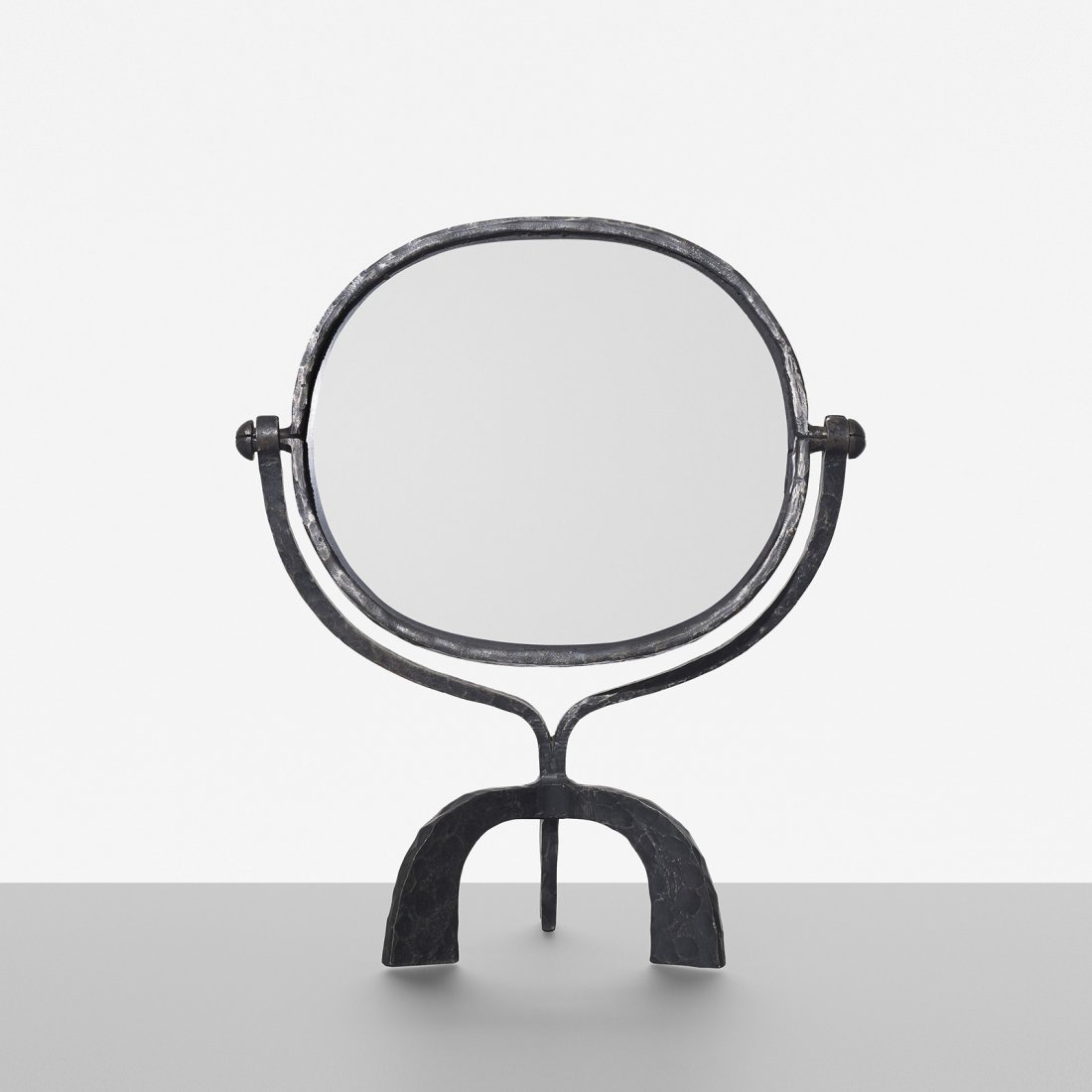 Bertil Vallien, attribution table mirror: Bertil Vallien, attribution table mirror Boda Smide Sweden, c. 1960 wrought iron, mirrored glass 15.5 w x 8 d x 18.5 h inches Provenance: Acquired from Boda Smide in 1964