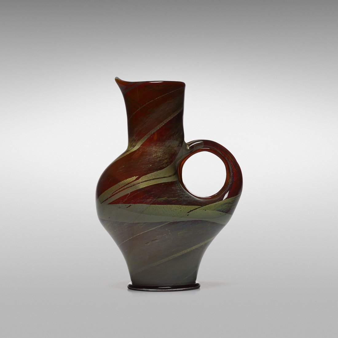 Ercole Barovier Ambrati ewer: Ercole Barovier Ambrati ewer Barovier & Toso Italy, 1956 internally decorated glass with gold leaf and applied foot 6.25 w x 4.75 d x 9 h inches Literature: Venetian Art Glass: An American Collection 