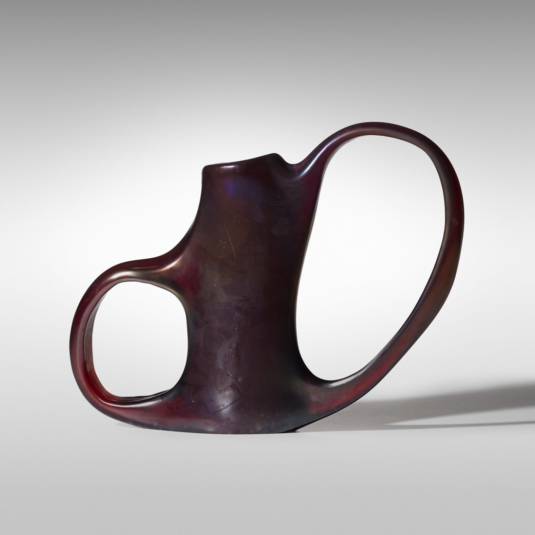 Giorgio Ferro Anse Volante vase: Giorgio Ferro Anse Volante vase A.V.E.M. Italy, 1952 iridized glass 14 w x 3 d x 10.5 h inches Literature: Venetian Art Glass: An American Collection 1840-1970, Barovier, pg. 299 illustrates this exam