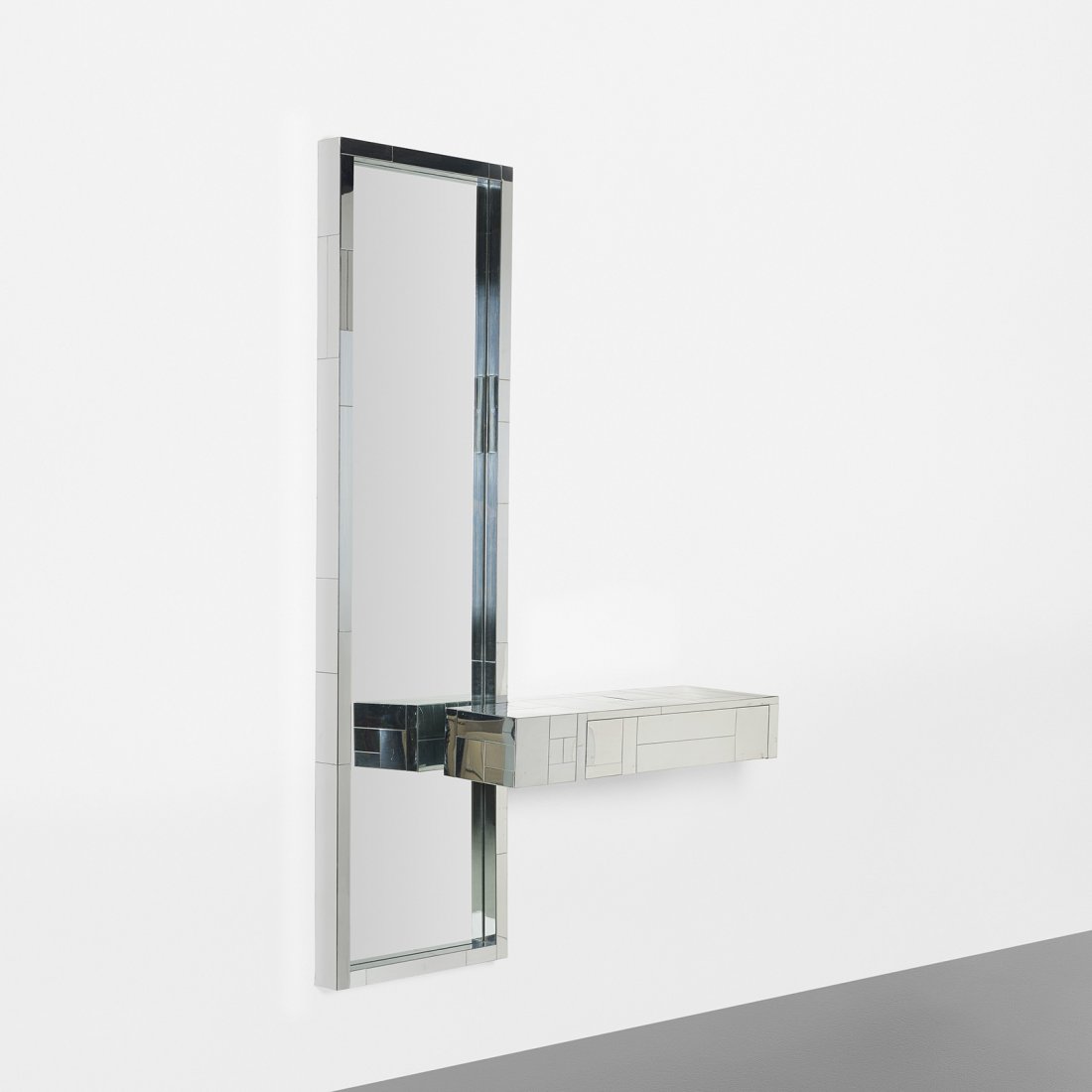 Paul Evans Cityscape console and mirror: Paul Evans Cityscape console and mirror Paul Evans Studio for Directional USA, c. 1970 chrome-plated steel, mirrored glass 48 w x 12 d x 72 h inches