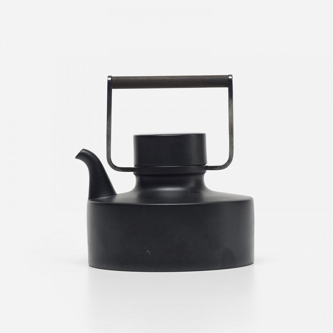 Tapio Wirkkala teapot: Tapio Wirkkala teapot Rosenthal Finland, 1963 glazed stoneware, teak, silverplate 5.5 w x 5 d x 6 h inches Signed with transfer-printed manufacturer's mark to underside: [Rosenthal Porcelain Noire Wir