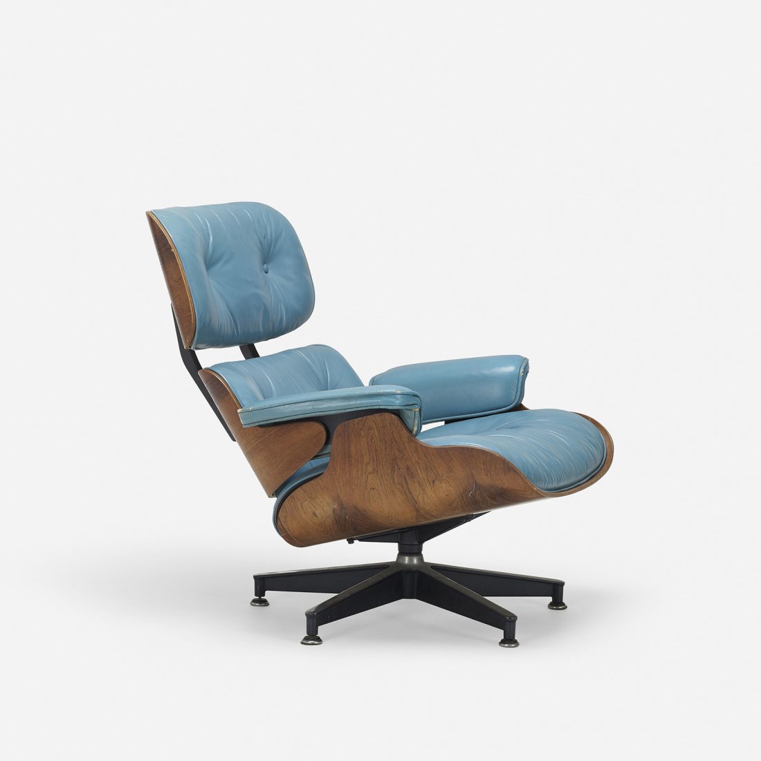 Charles and Ray Eames special-Order 670 lounge chair: Charles and Ray Eames special-Order 670 lounge chair Herman Miller USA, 1956 rosewood plywood, leather, enameled aluminum, rubber 33 w x 35 d x 33 h inches This iconic chair features light blue uphols
