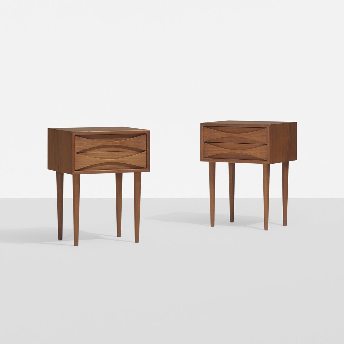 Arne Vodder nightstands, pair: Arne Vodder nightstands, pair Sibast Mobler Denmark, c. 1960 teak 15.75 w x 12.5 d x 21.25 h inches Nightstands each feature two drawers.