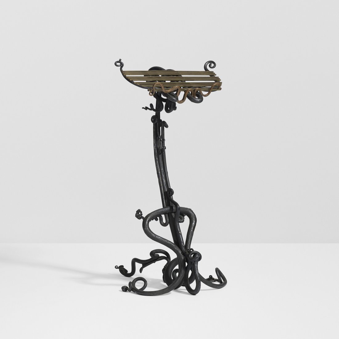Albert Paley Important and Early music stand: Albert Paley Important and Early music stand USA, 1971 forged and fabricated steel, brass and copper 24.5 w x 28 d x 45.5 h inches This work is believed to be the first piece of furniture Paley design