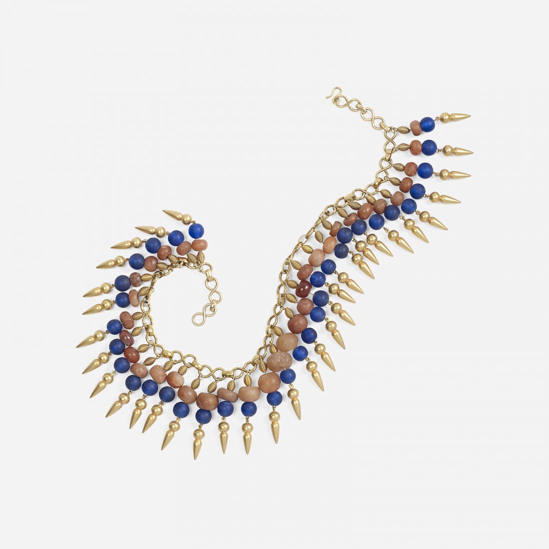 Robert Lee Morris a bullet head necklace: Robert Lee Morris a bullet head necklace A gold-plated bead and coral necklace made for the Donna Karan Resort show in the late 1980s. Necklace measures 18 inches in length.