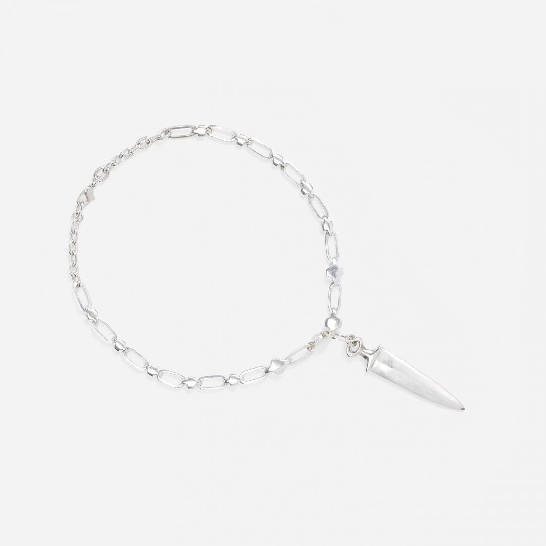 Robert Lee Morris a silver dagger necklace: Robert Lee Morris a silver dagger necklace A sterling silver necklace with a dagger pendant. Signed '1995 Robert Lee Morris 925'. Necklace is adjustable measuring 18.5 - 20.5 inches in length. Total w
