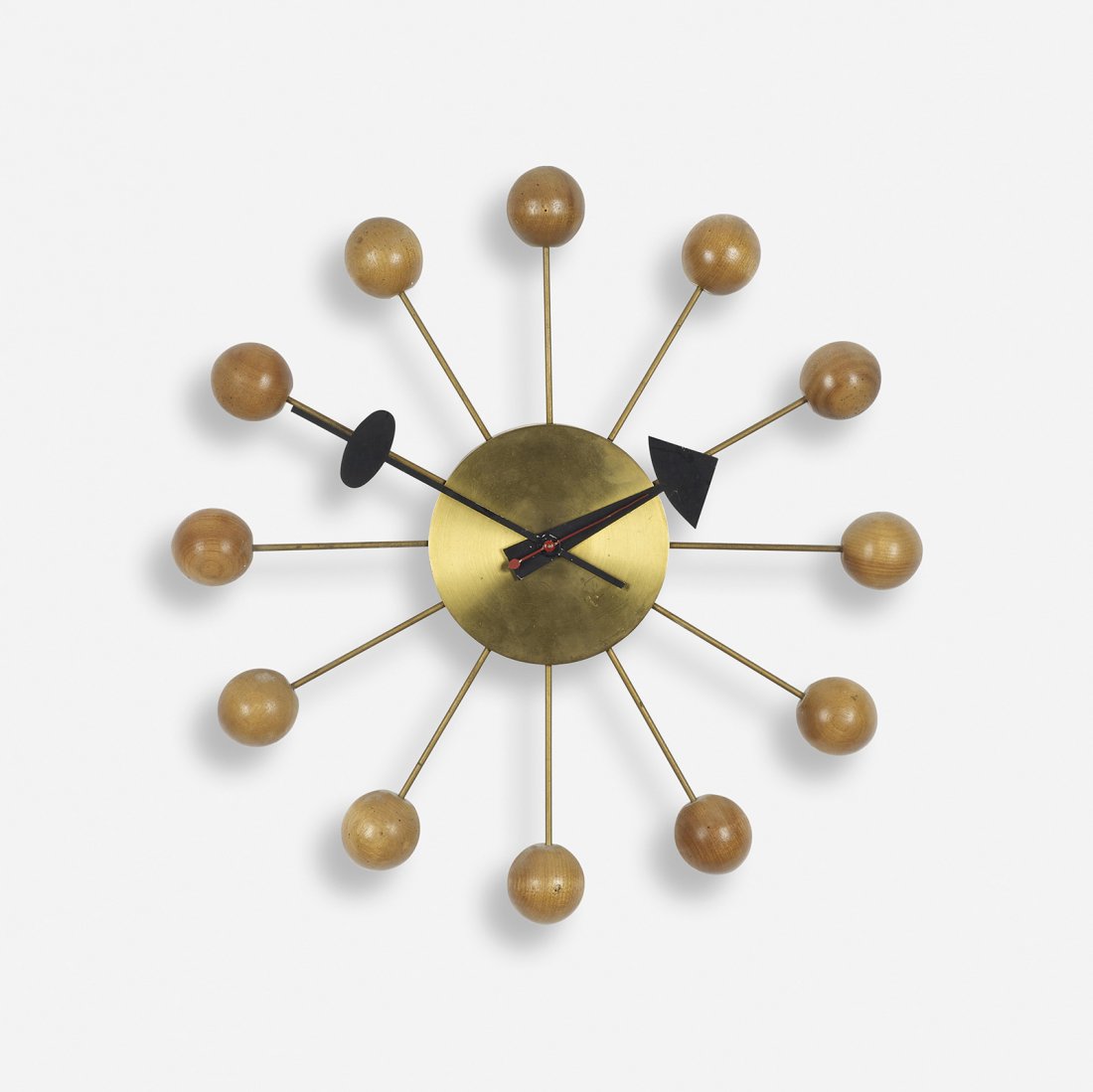 George Nelson & Associates Ball wall clock, model 4755B: George Nelson & Associates Ball wall clock, model 4755B Howard Miller Clock Company USA, 1949 brass, walnut, enameled aluminum 13.25 dia x 29 h inches Signed with partially applied foil manufacturer's