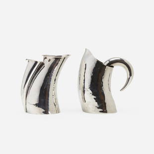 William Sawaya, pitchers, pair: William Sawaya Le Diable en Tete and Le Diable au Corps pitchers, pair Sawaya & MoroniItaly, 1992hand-hammered sterling silver9 w x 5 d x 10.25 h in (23 x 13 x 26 cm) Signed with impressed