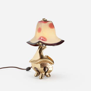 Jordan Mozer, Plie table lamp: Jordan Mozer Plie table lamp USA, 1992 polished bronze, hand-blown glass 6 w x 8.5 d x 13.25 h in (15 x 22 x 34 cm) This form was originally designed for the Iridium Jazz club at the Empire