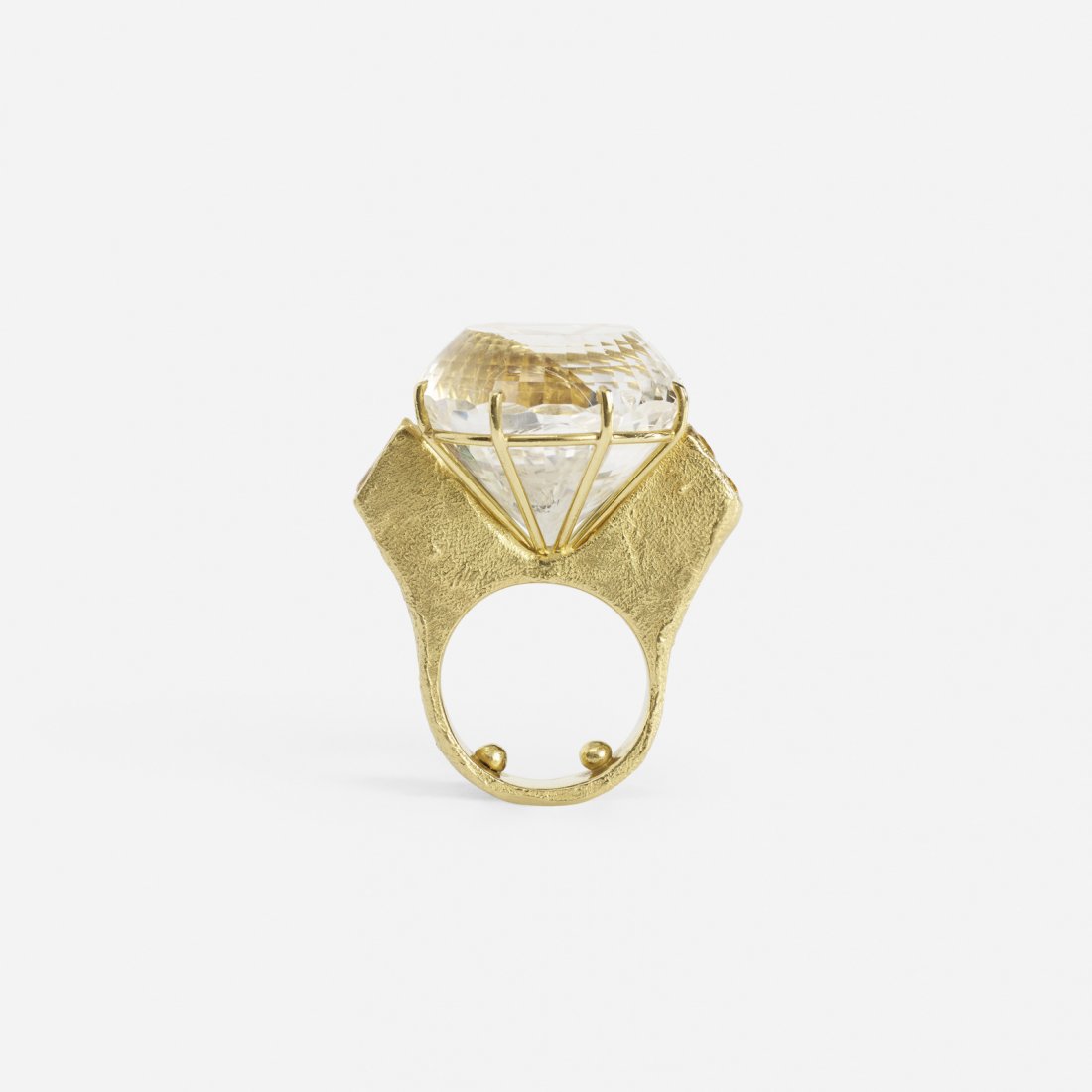 A gold and white topaz ring (1 of 2)