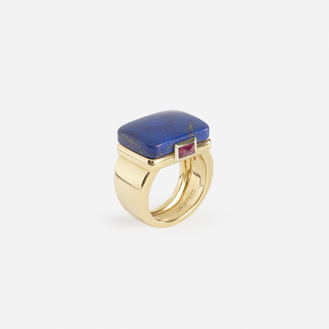 Fred, A gold, lapis lazuli and ruby ring: Fred A gold, lapis lazuli and ruby ring France An 18 karat gold ring with lapis lazuli tablet measuring 18 millimeters in length and 1 rectangular sugar loaf cut ruby measuring 4.5 millimeters in leng
