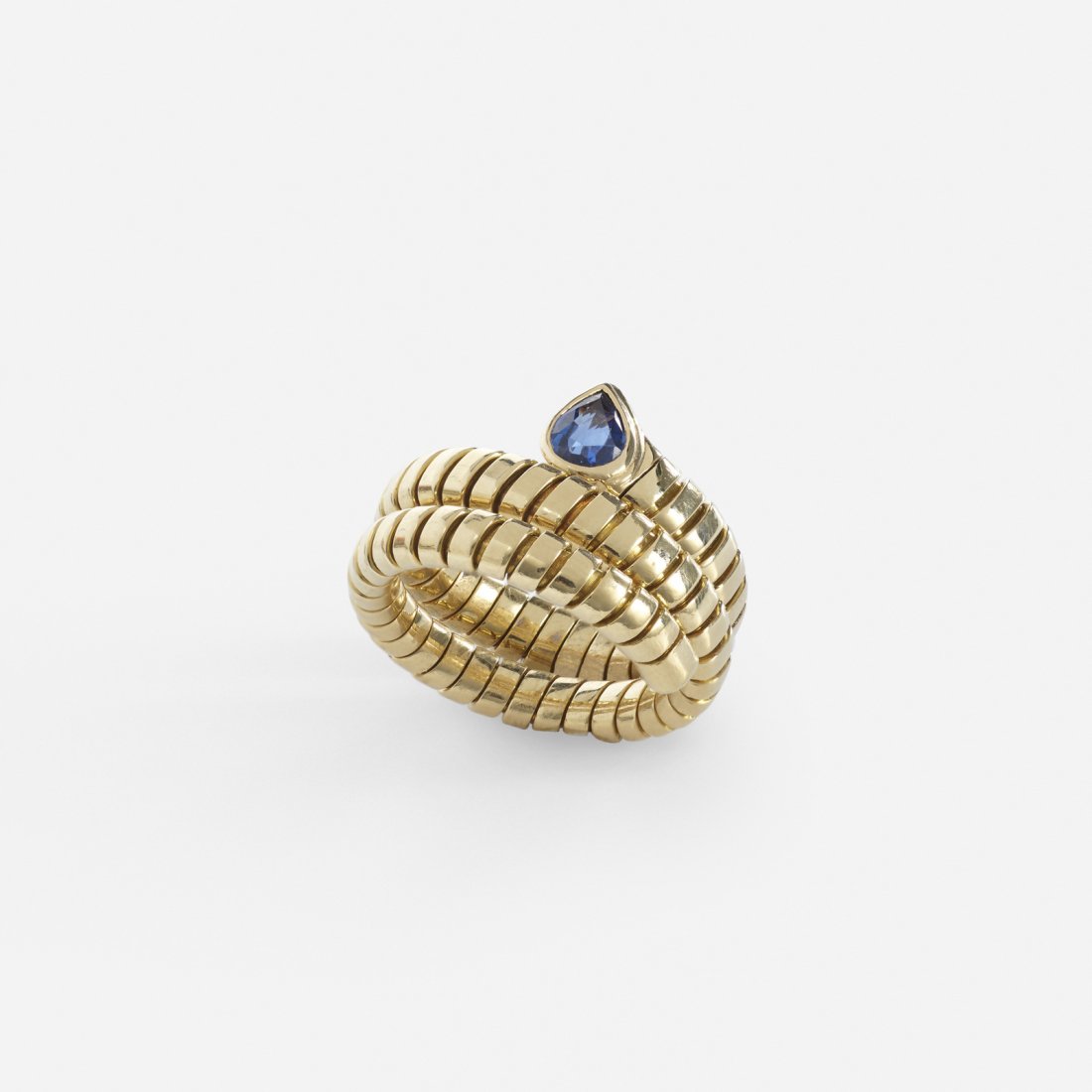 Bulgari, A gold and sapphire Tubogas ring (1 of 2)