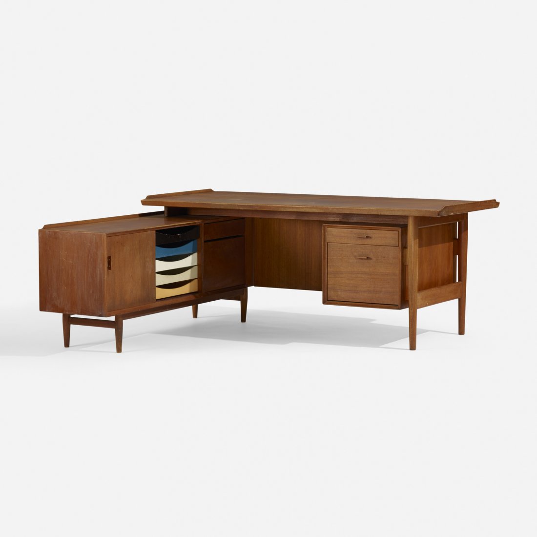 Arne Vodder, desk and return: Arne Vodder desk and return Sibast FurnitureDenmark, c. 1955teak, matte nickel-plated brass29 h x 70 w in (74 x 178 cm) Signed with Danish control tag and applied decal manufacturer's la