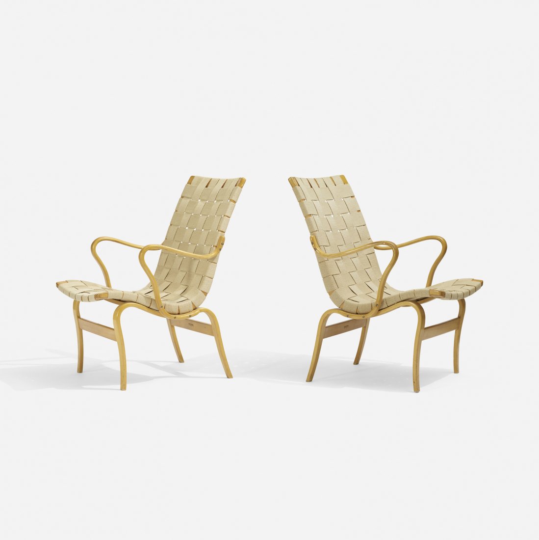 Bruno Mathsson, Eva chairs, pair: Bruno Mathsson Eva chairs, pair Karl MathssonSweden, 1935 / 1964laminated steam-bent beech, canvas33 h x 23.25 w x 27.25 d in (84 x 59 x 69 cm) Signed with branded manufacturer's mark t