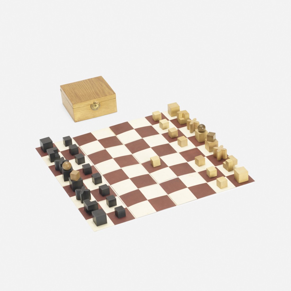 Josef Hartwig, Bauhaus chess set: Josef Hartwig Bauhaus chess set Bauhaus WeimarGermany, 1923 / 1926maple, walnut, oak, lacquered wood, paper, linen5 w x 5 d x 2.5 h in (13 x 13 x 6 cm) Provenance: Gift