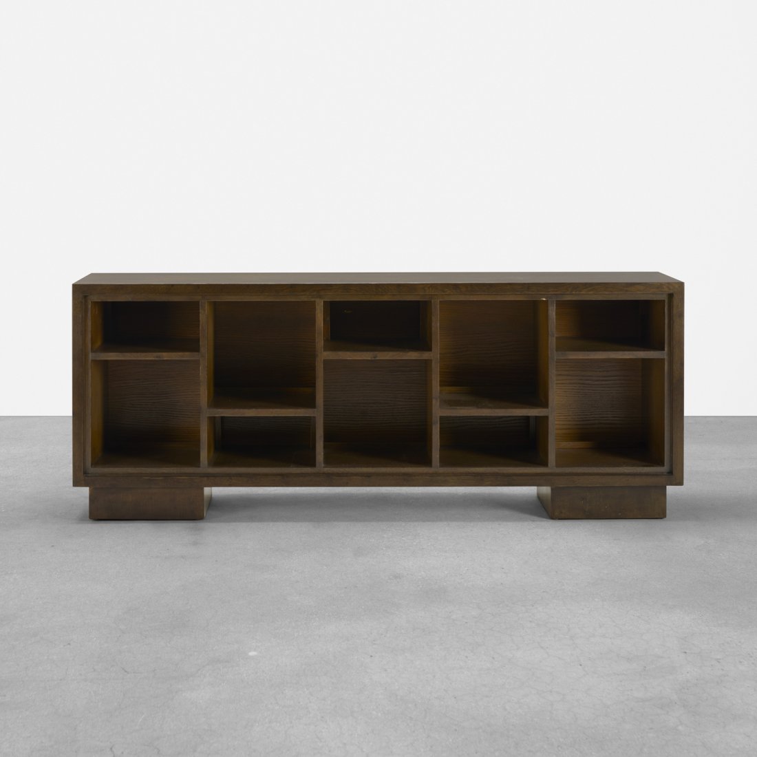 Samuel Marx, bookcase from the Morton D. May House: Samuel Marx bookcase from the Morton D. May House USA, 1940stained oak72 w x 17.75 d x 28 h in (183 x 45 x 71 cm) Provenance: Morton D. May, Ladue, MO | David B. Lichtenstein