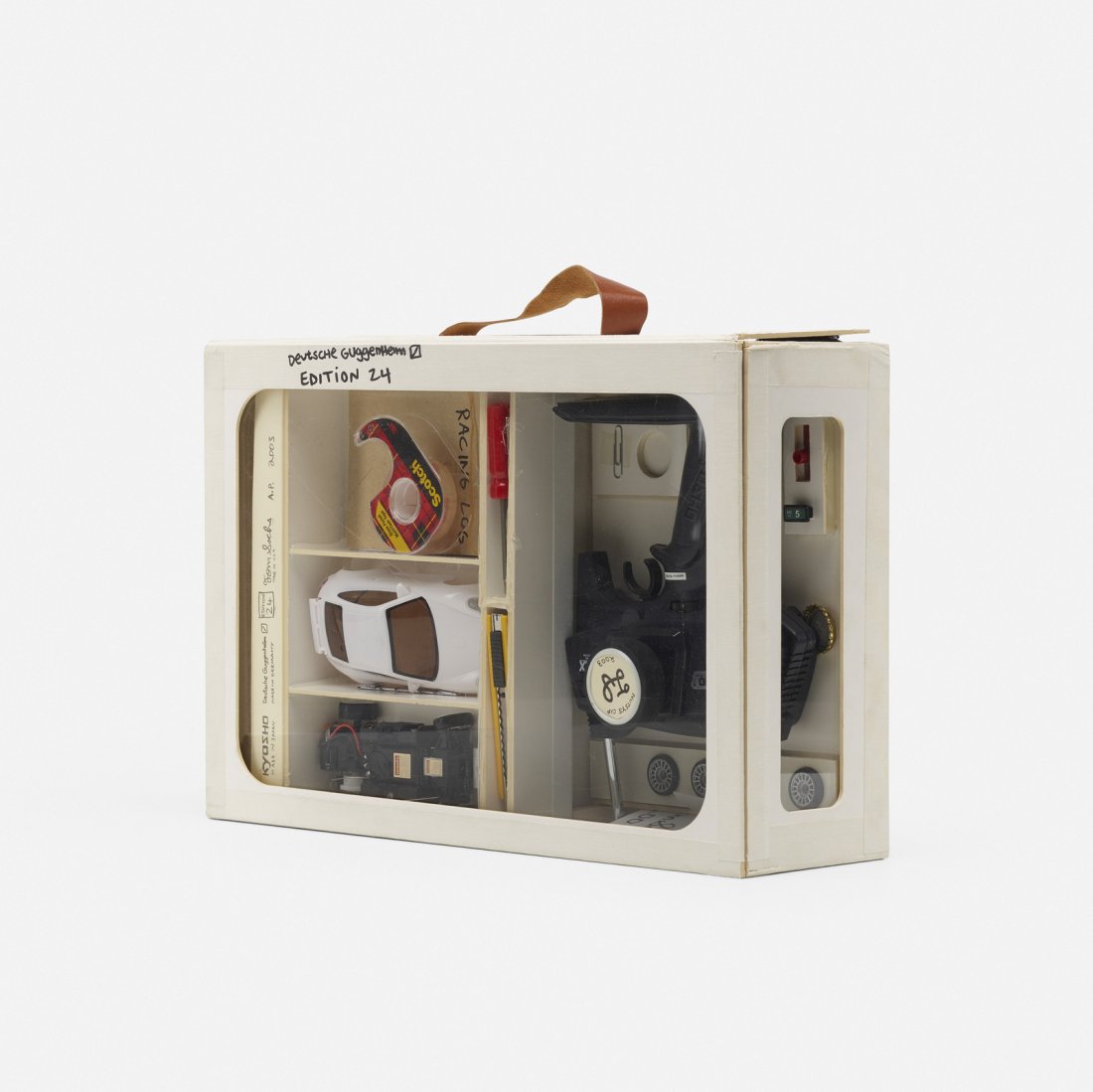 Tom Sachs, Deluxe Racing Set: Tom Sachs Deluxe Racing Set 2003mixed media assemblage5.25 h x 18 w x 12 d in (13 x 46 x 30 cm) Signed, numbered and dated to edge 'Tom Sachs 36/150 2003'. Signed, numbered and dated to interi