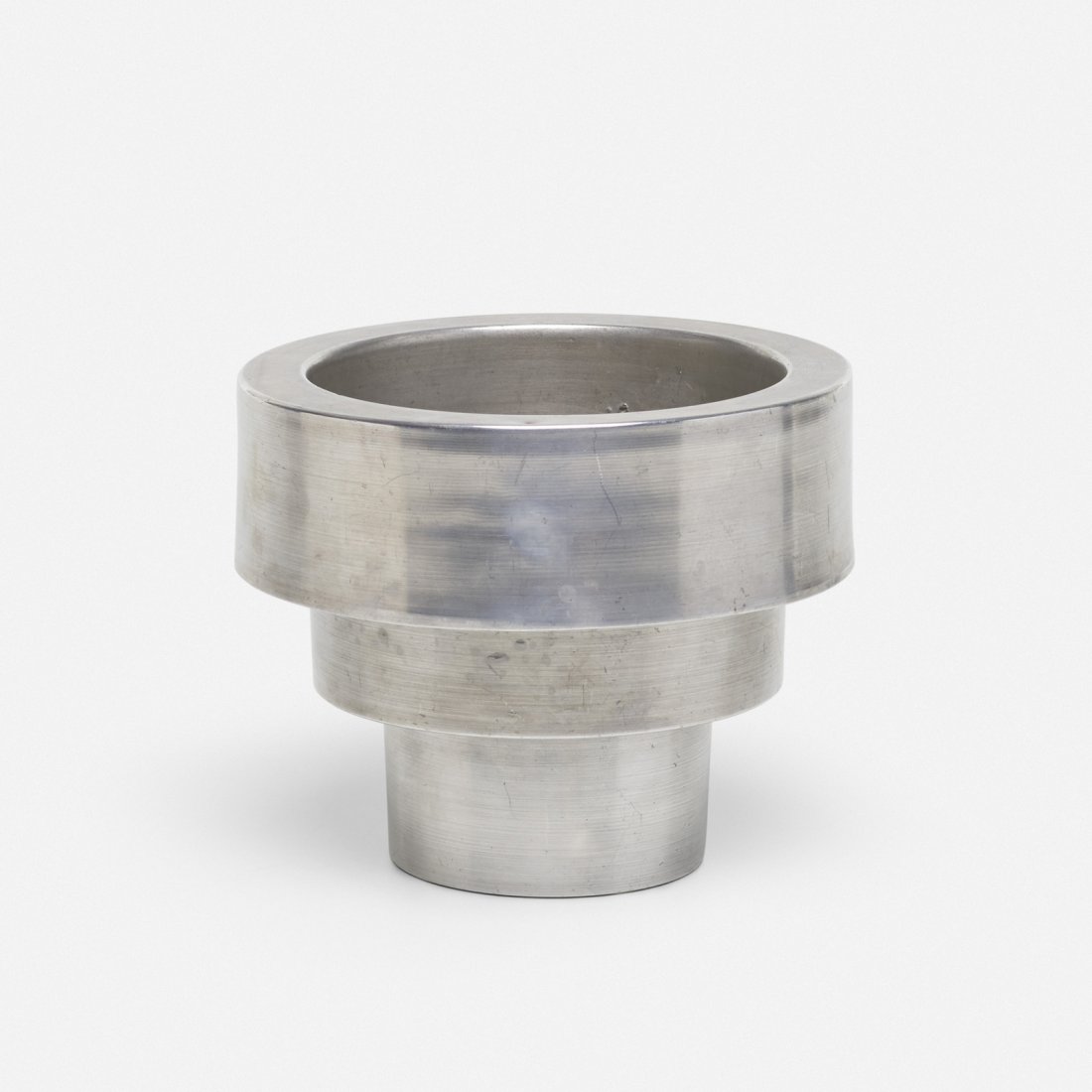 Russel Wright, vase: Russel Wright vase Russel Wright Inc.USA, c. 1930satin finished spun aluminum6.75 dia x 5.5 h in (17 x 14 cm) Impressed signature to underside: [Russel Wright]. Literature: