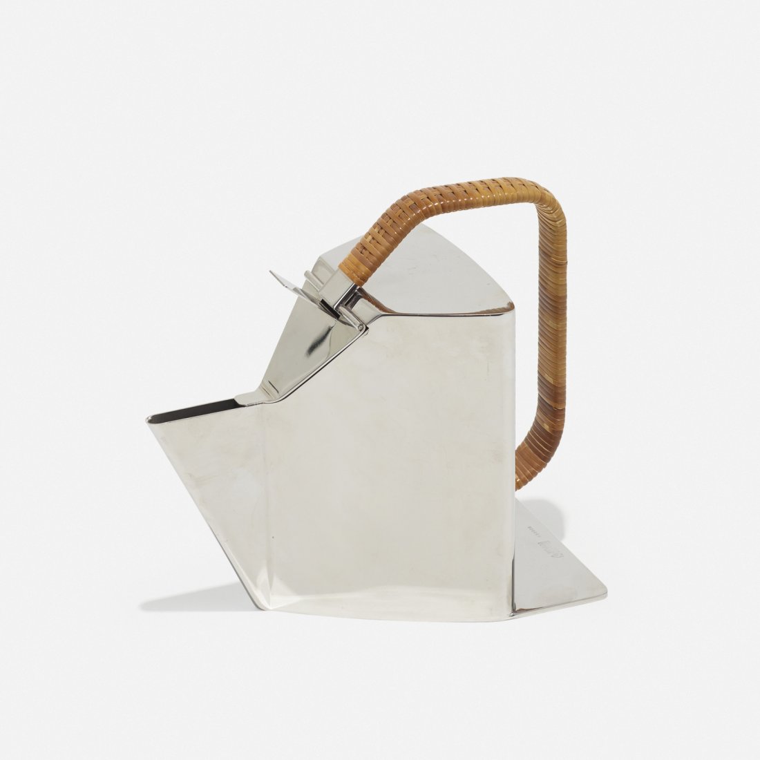 Richard Sapper, Bandung pitcher: Richard Sapper Bandung pitcher AlessiGermany / Italy, 1992stainless steel, cane8.5 w x 4.75 d x 7.75 h in (22 x 12 x 20 cm) Signed with impressed manufacturer's mark to base: [Officina Ales