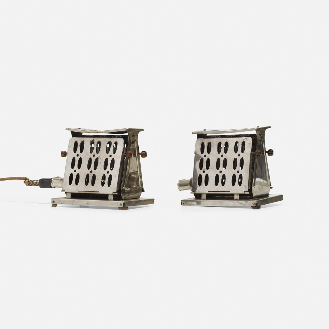 AEG, toasters, pair: AEG toasters, pair Germany, c. 1940 chrome-plated steel Signed with impressed manufacturer's mark to underside of each example: [AEG]. Provenance: Thessaloniki Design Museum, Gre