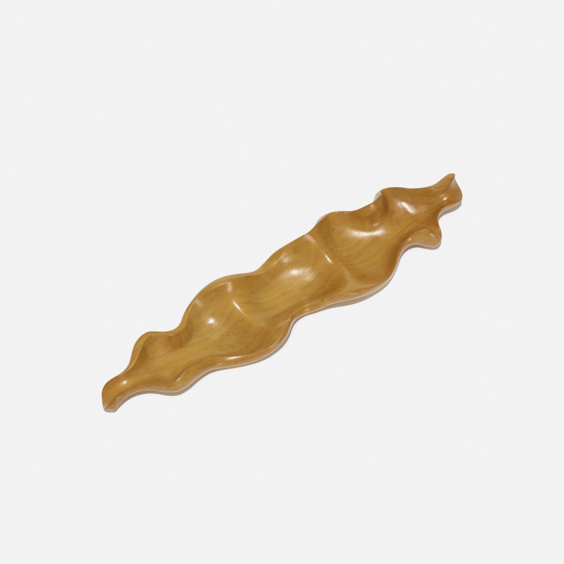 Russel Wright, Oceana tray: Russel Wright Oceana tray Klise WoodworkingUSA, 1935olivewood19.5 w x 4.5 d x 2 h in (50 x 11 x 5 cm) Branded signature to underside: [Russel Wright] Literature: