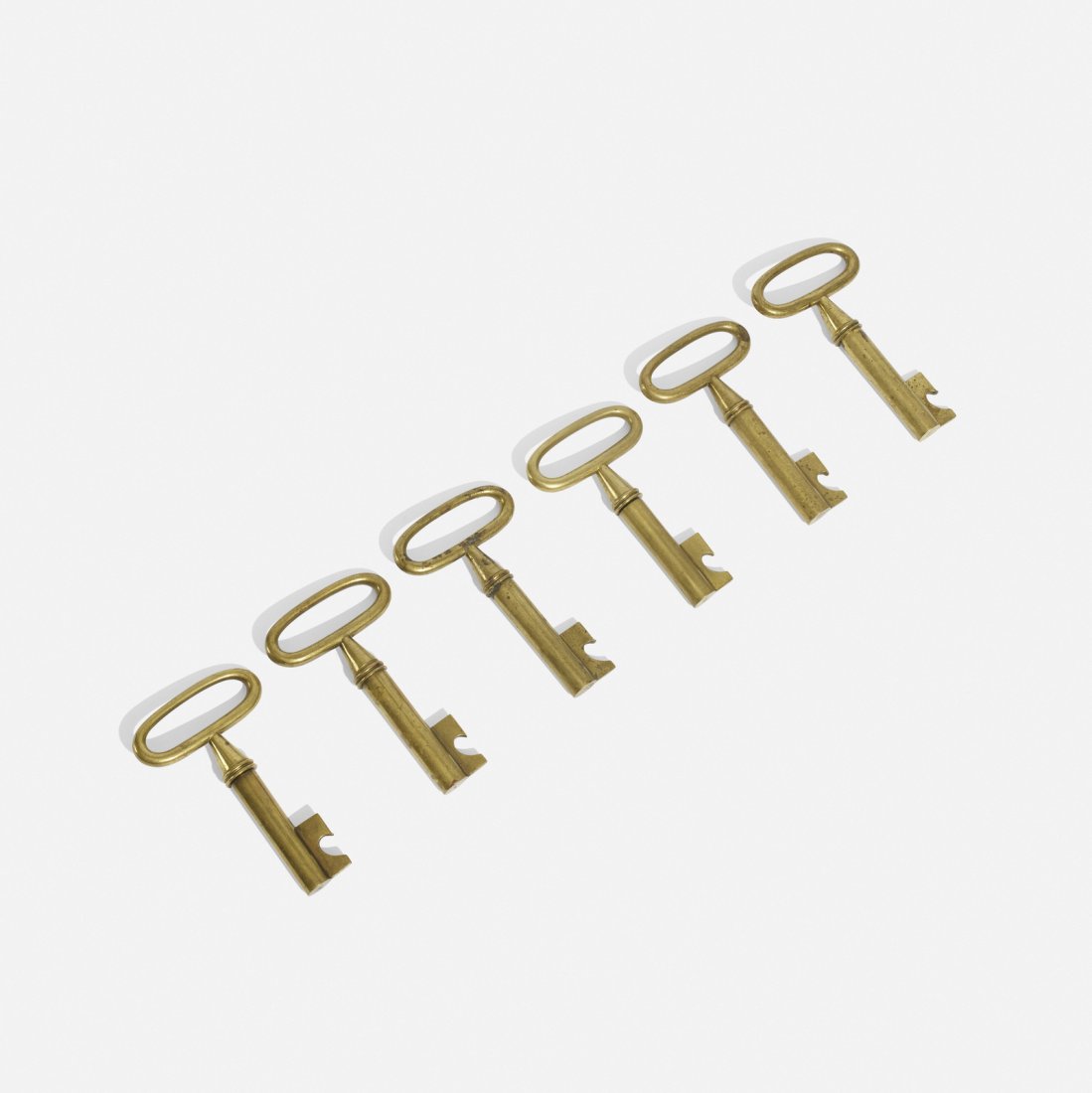 Carl Aubock II, corkscrews, set of six: Carl Aubock II corkscrews, set of six Austria, 1938brass4.75 w x 2.75 d x 0.75 h in (12 x 7 x 2 cm) Not simply decorative objects, Aubock's skeleton key corkscrews can be used as paperweights or