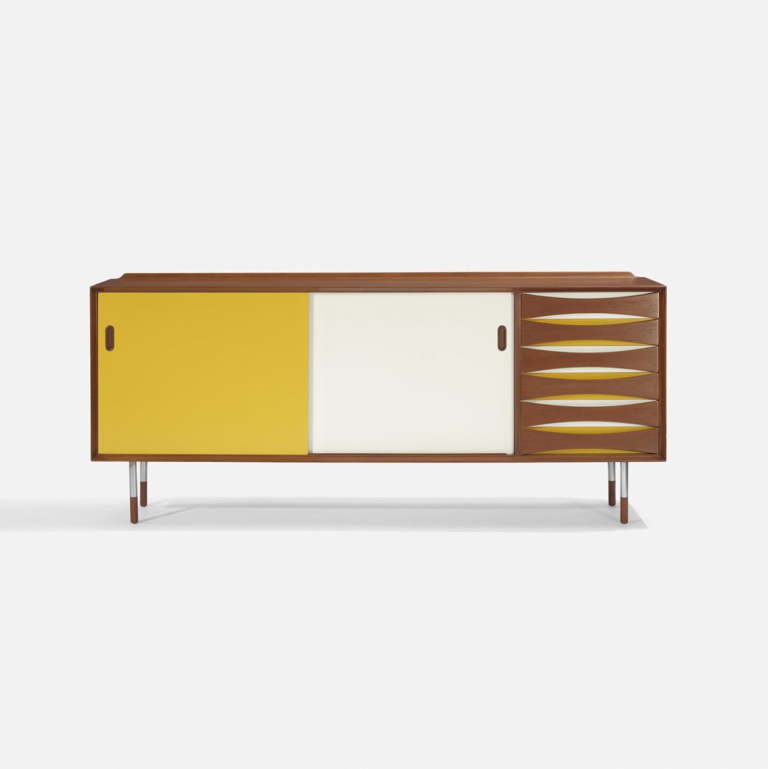 Arne Vodder, cabinet: Arne Vodder cabinet Sibast FurnitureDenmark, c. 1960teak, lacquered wood, chrome-plated steel72 w x 19.5 d x 31 h in (183 x 50 x 79 cm) Cabinet features six drawers and two sliding doors co