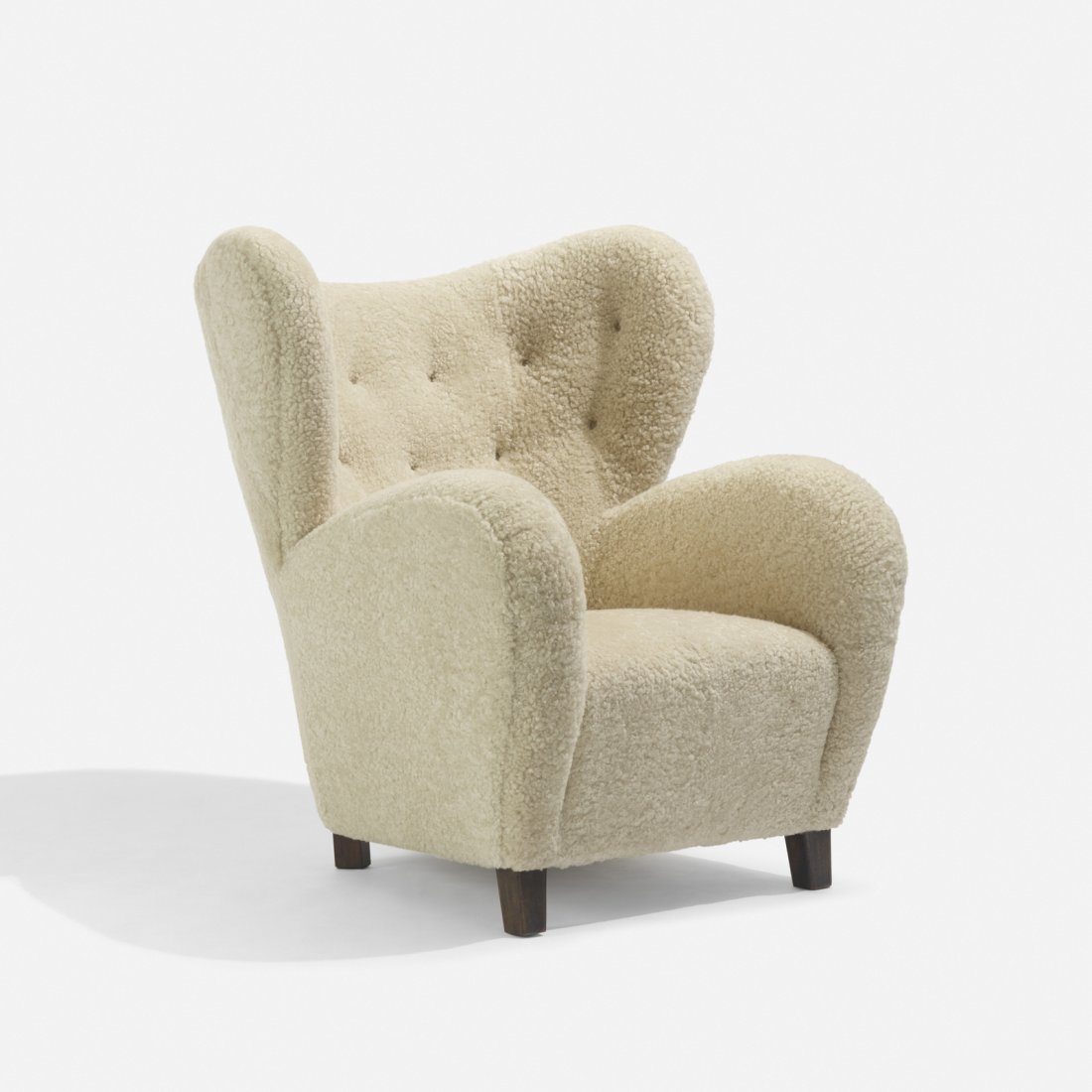 Flemming Lassen, attribution, lounge chair: Flemming Lassen, attribution lounge chair Denmark, c. 1935sheepskin, stained beech37 w x 39 d x 39.75 h in (94 x 99 x 101 cm)