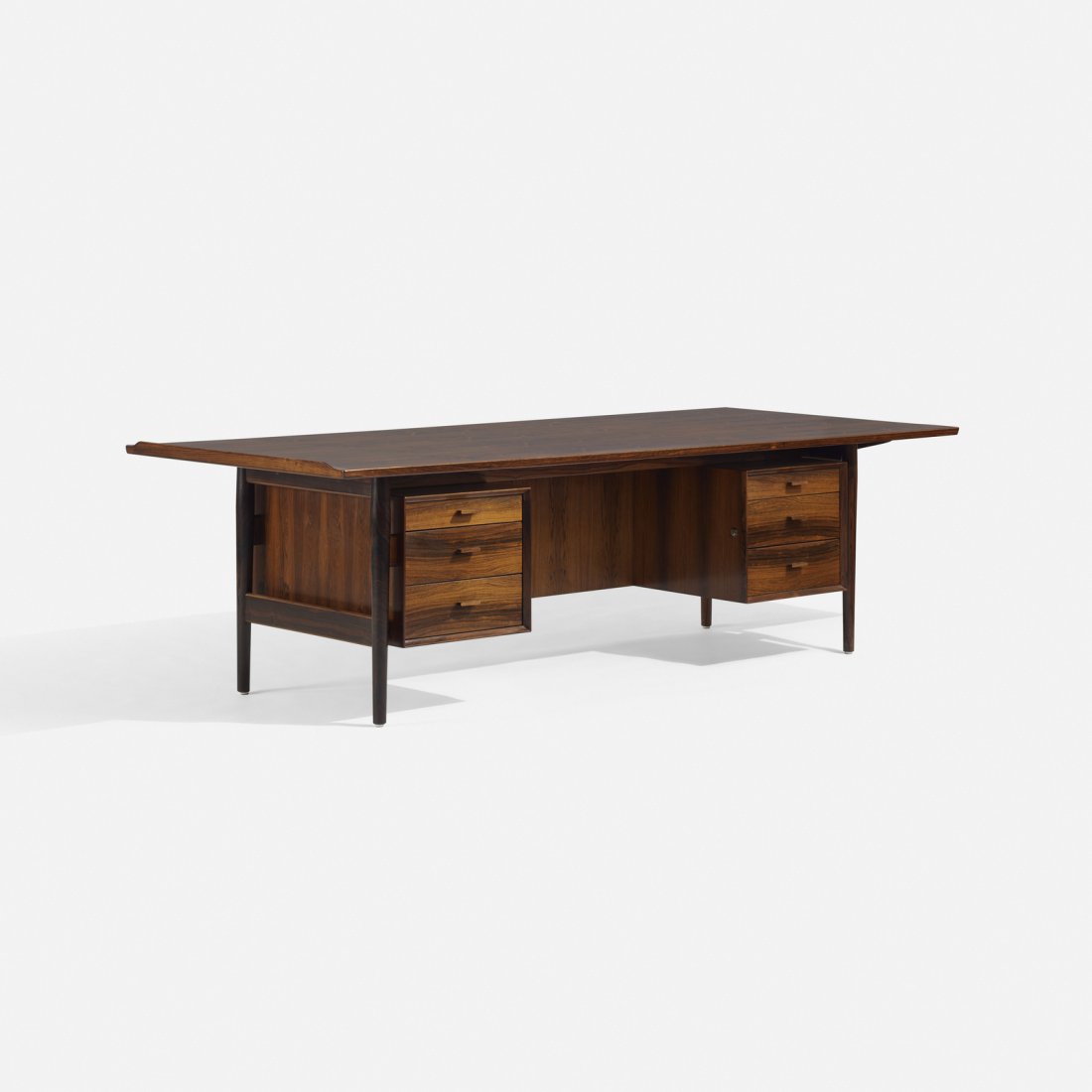 Arne Vodder, desk, model 216: Arne Vodder desk, model 216 Sibast FurnitureDenmark, c. 1970rosewood97 w x 41 d x 28.75 h in (246 x 104 x 73 cm) Desk features six drawers. Signed with applied manufacturer's mark to unders