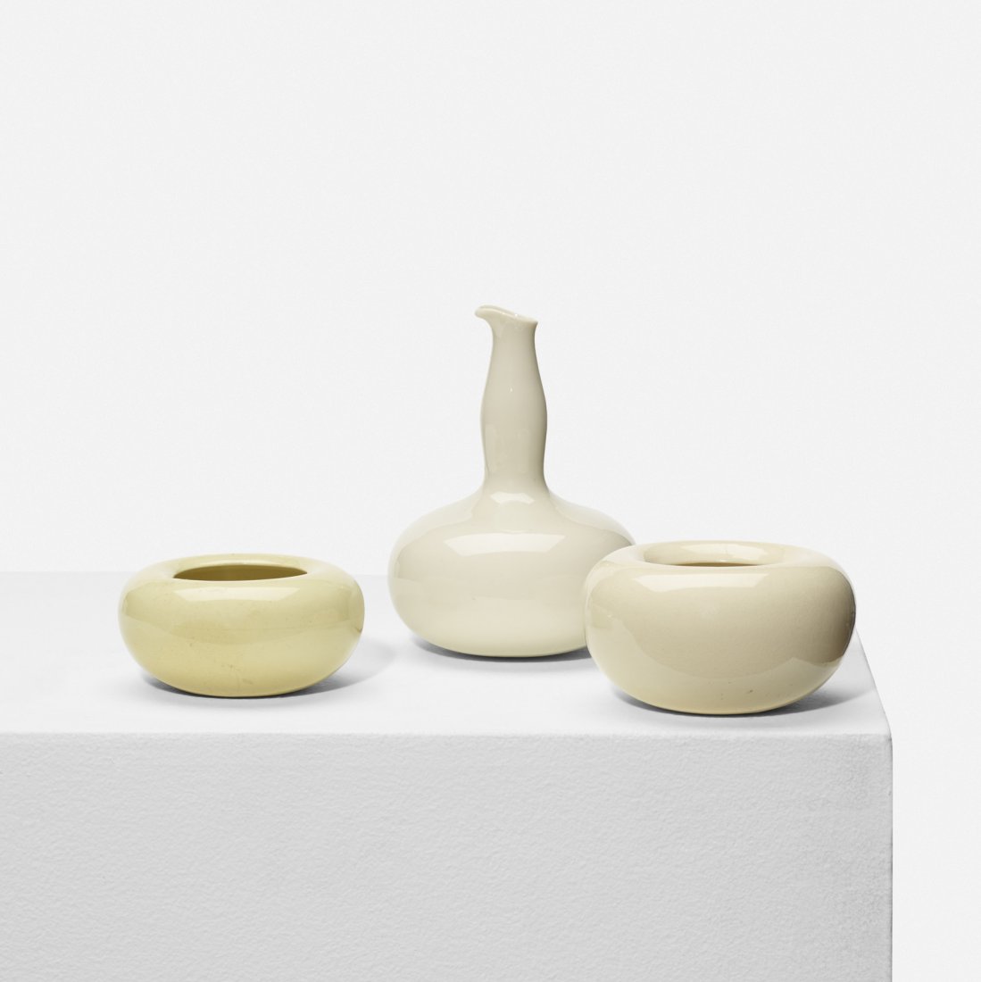 Eva Zeisel, condiment set: Eva Zeisel condiment set Riverside Ceramics CompanyHungary / USA, 1947glazed porcelain4.75 dia x 7 h in (12 x 18 cm) Set includes one cruet and two bowls. Signed with stamped manufacturer's