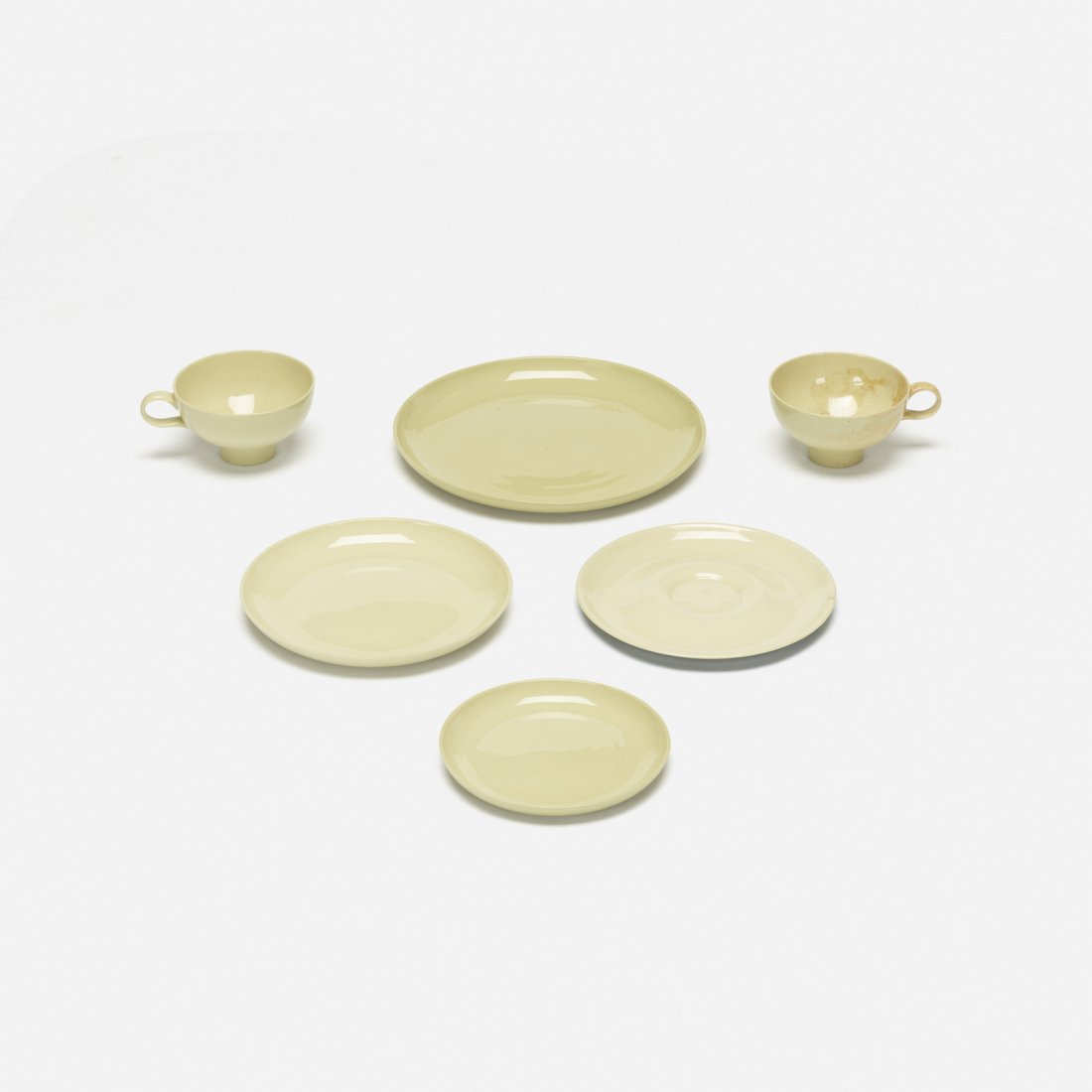 Eva Zeisel, collection of tableware: Eva Zeisel collection of tableware Riverside Ceramics CompanyHungary / USA, 1947glazed porcelain9.5 dia x 0.75 h in (24 x 2 cm) Collection includes three plates, two teacups and one saucer.