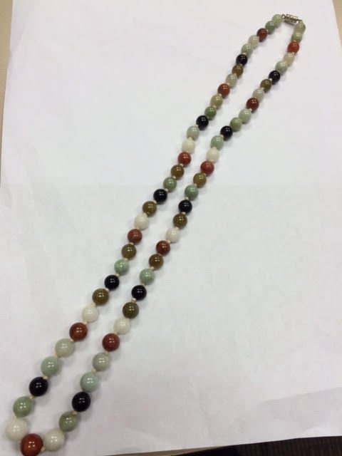 This is a 1970's multicolored Jadeite jade bead (1 of 1)