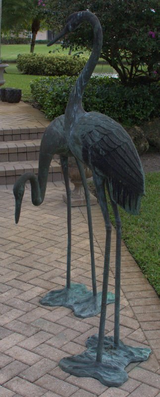 Pair of large bronze bird sculptures depicting cranes. (1 of 4)