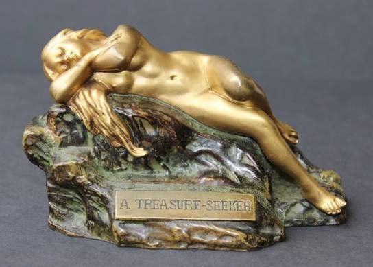 T. CURTS CARL KAUBA "A TREASURE SEEKER" BRONZE: T. Curts aka Carl Kauba (AUSTRIA, 1865-1922) Vienna bronze sculpture depicting a man digging on a mound of soil. The top can be removed to depict a reclining gold gilded nude female. A placard to the 