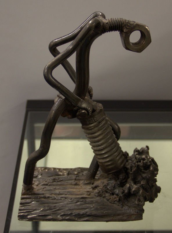 F. Russo Nuts and Bolts sculpture: Vintage nuts and bolts sculpture of a man with jackhammer. Signed F. Russo measures 9 1/2" High x 7 1/4" Long x 4 1/2" wide approximately.
