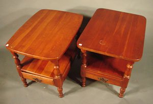 Two cherry one drawer end tables. One drawer slid: Two cherry one drawer end tables. One drawer slide is loose and minor stains to surface. 23"h x 21 1/2"w x 28"d