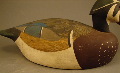 Decoy, hand painted with glass eyes. 6"h x 6"w x 1 - 3