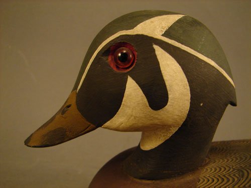 Decoy, hand painted with glass eyes. 6"h x 6"w x 1 - 4