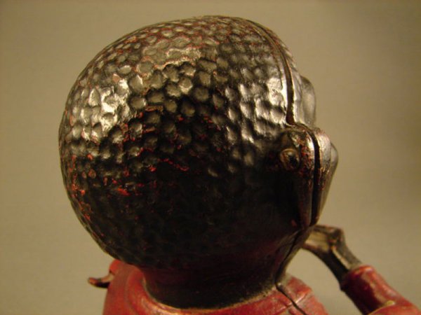 "Jolly Nigger" Mechanical bank. 7"h x 5 1/2"w x 5 - 7