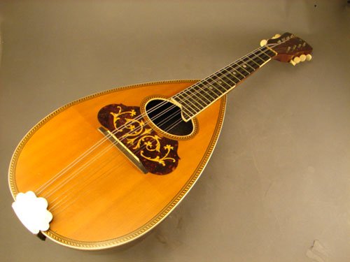 T.B. & Co Sterling Barrel Back Mandolin. Slight c