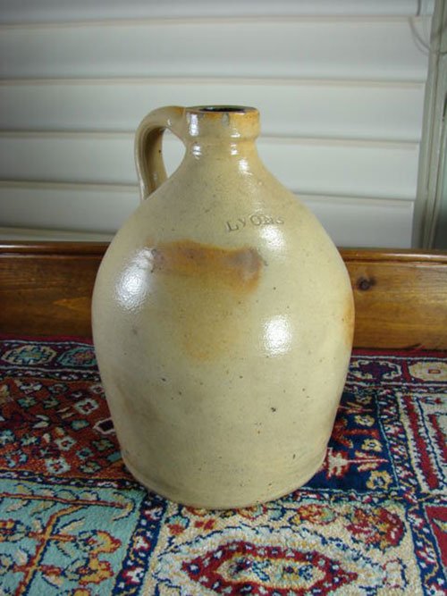 Lyons Signed 1 Gallon Stoneware Jug. 10 1/2" h x 6 1