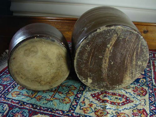 Two Antique Stoneware Jugs in brown glaze. 1 gallon - 3