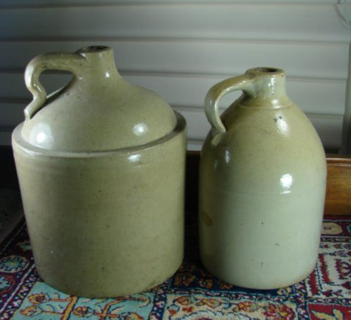Two Antique Stoneware Jugs. Unmarked. Largest 13" h