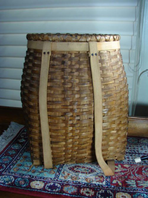 32 Antique Adirondack Pack Basket with canvas straps.