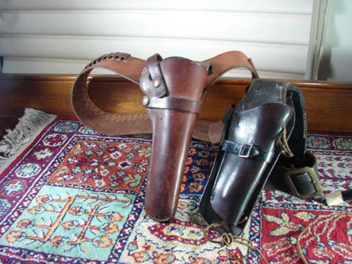 Two Vintage Leather Pistol Holsters. Waist type. Br